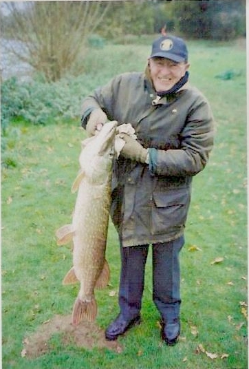 A pike from the Medway, Colin Watson holds the fish. It was around 32lbs
      in weight.
